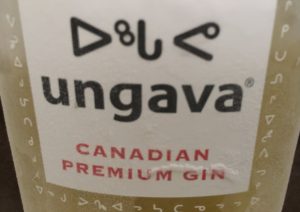 The unique script and characters on the bottle is Inuktitut, the language of the inuit